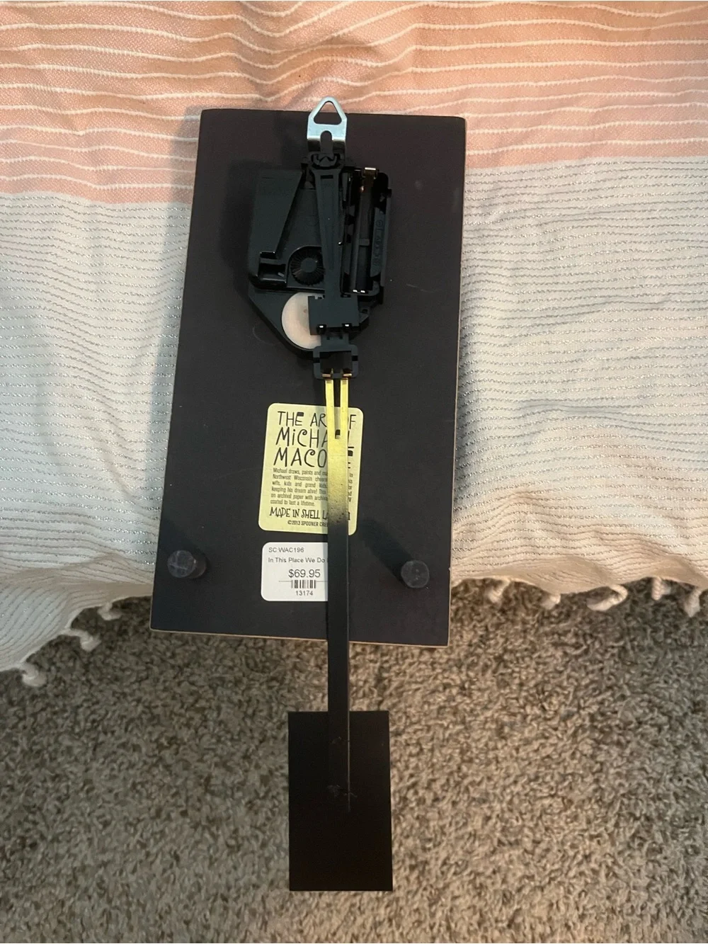 MAC Cosmetics decorative pendulum